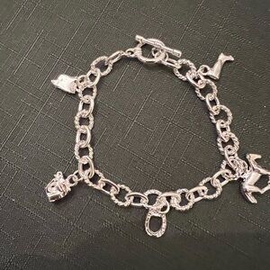 New silver tone horse and riding themed 8.25” room link charm bracelet